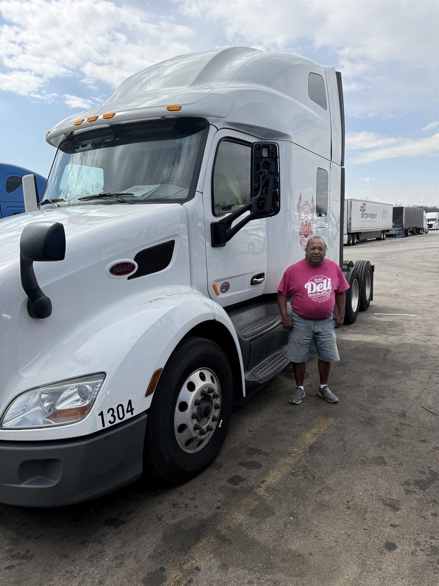 Delta driver Ernest with his truck, unit 1304