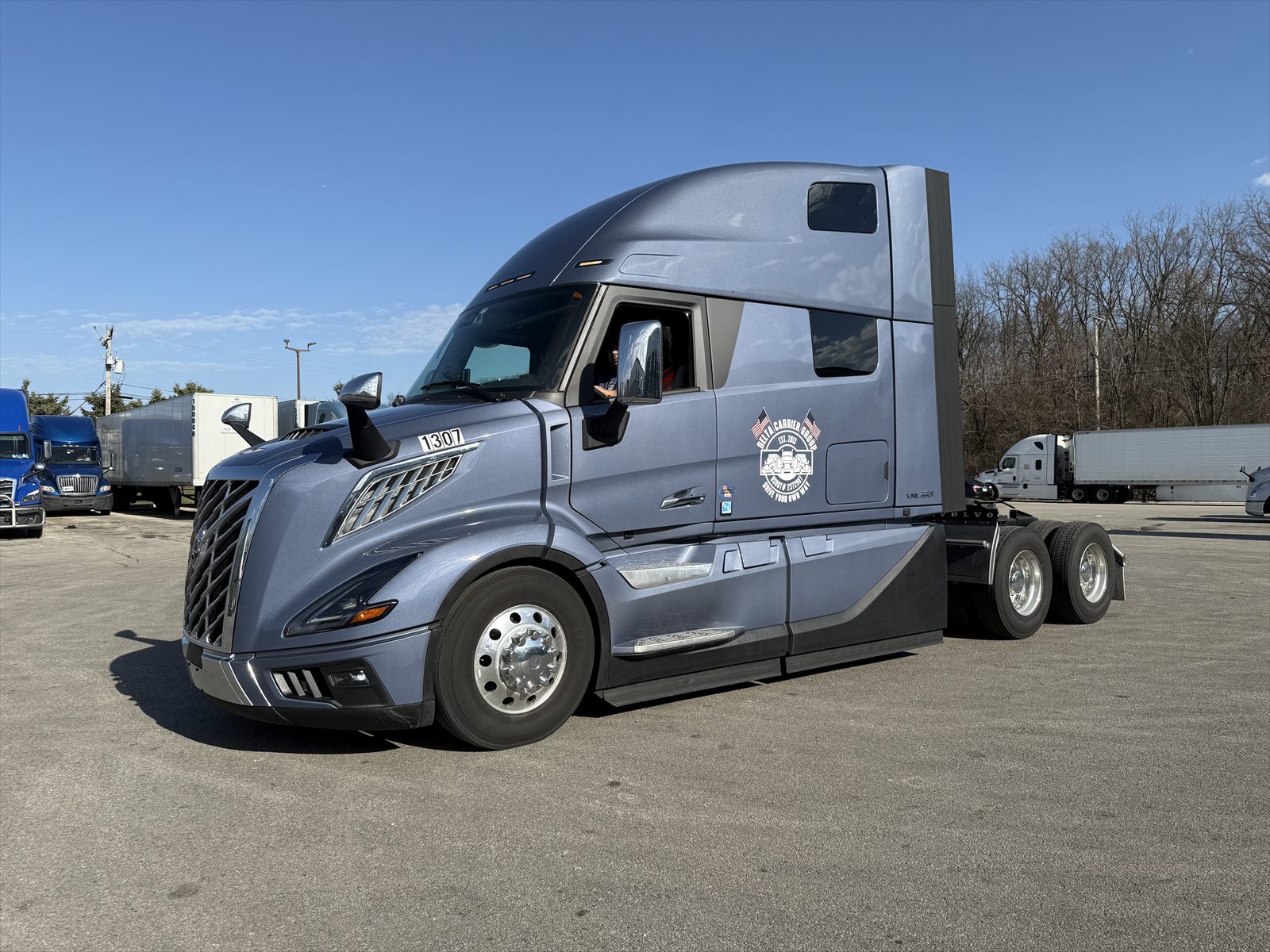 Delta drivers Milton and Bairon with their Volvo VNL, unit 1307