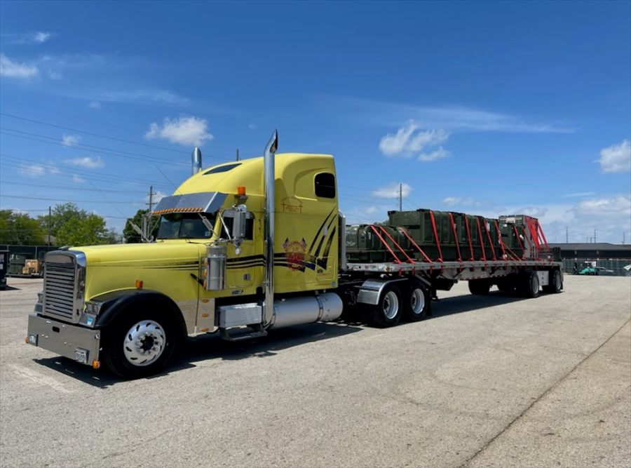 Delta Carrier Group yellow Freightliner Classic XL parking
