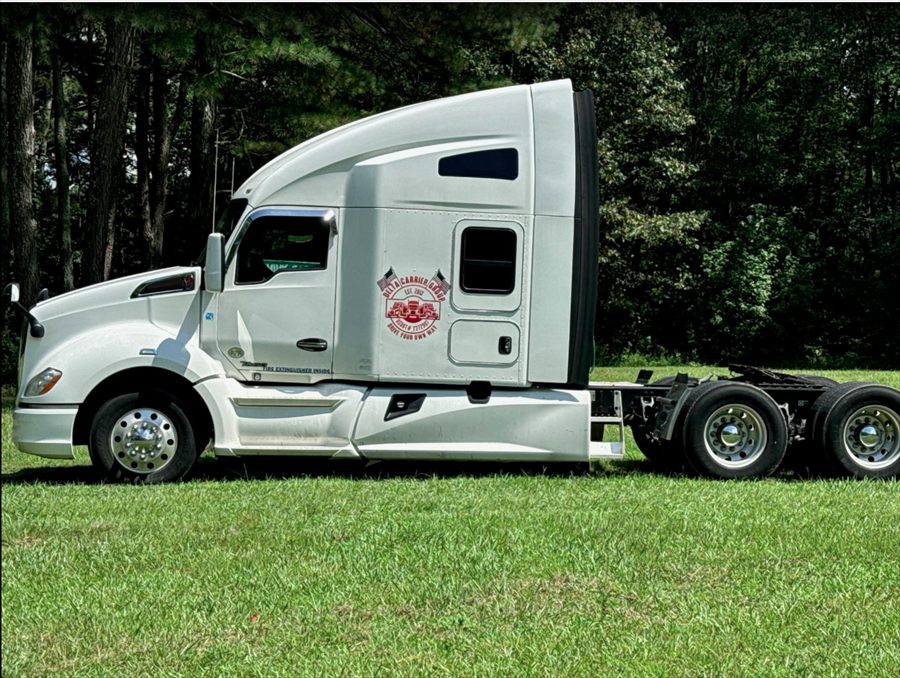 Delta Carrier Group white Kenworth T680 (door badge reads T680; filename claims International) unit 1346 yard