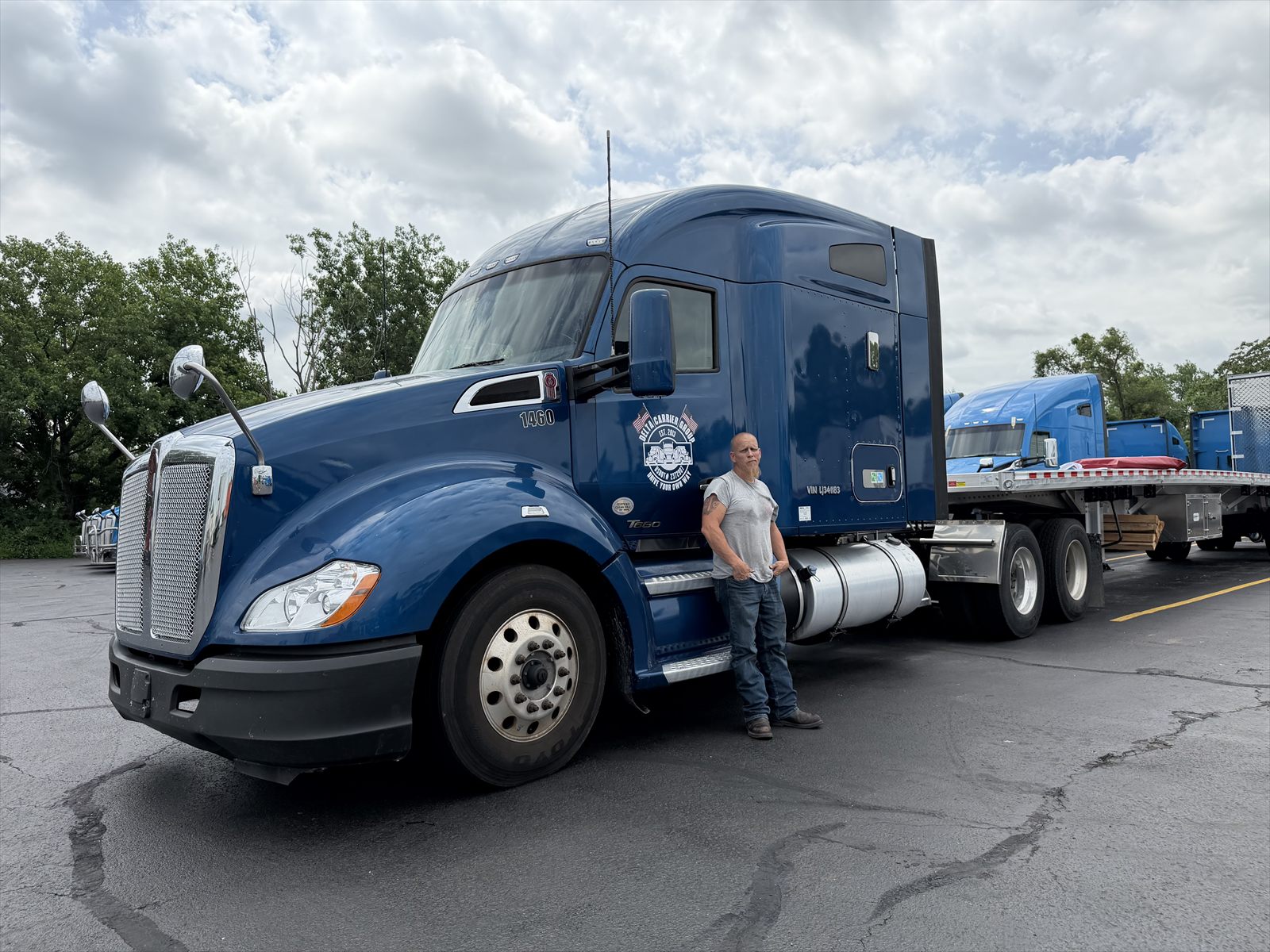 Delta driver Brian Majors at the door of his Kenworth T680