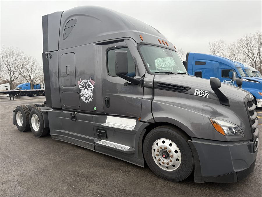 Delta Carrier Group graphite grey Freightliner Cascadia unit 1392 yard