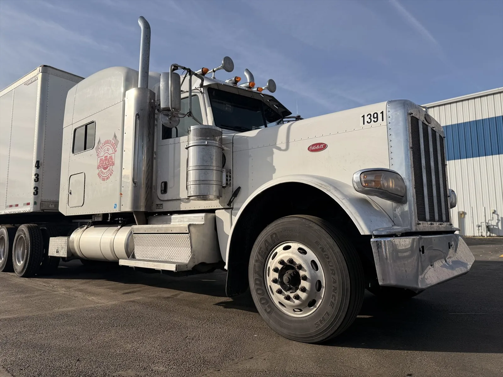 Delta Carrier Group white Peterbilt 389 unit 1391 yard